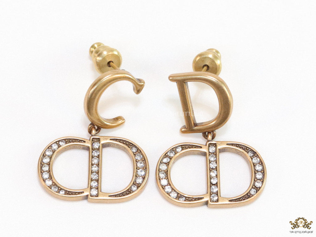 Designer alphabet earrings in gold and cz