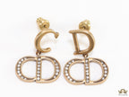 Designer alphabet earrings in gold and cz