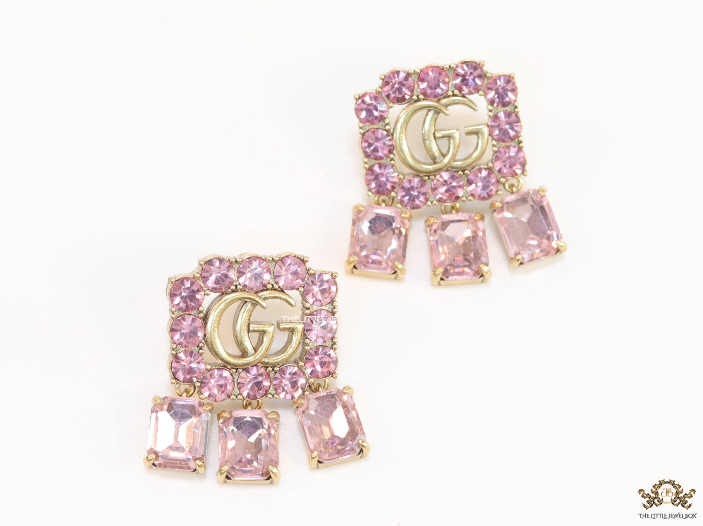 Lavender stone studes with gold plaetd double G motif and lavender stone drop