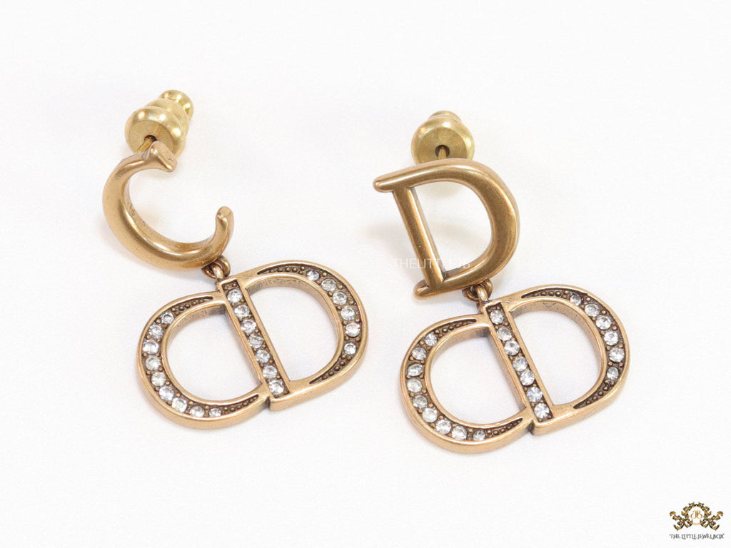 Designer alphabet earrings in gold and cz