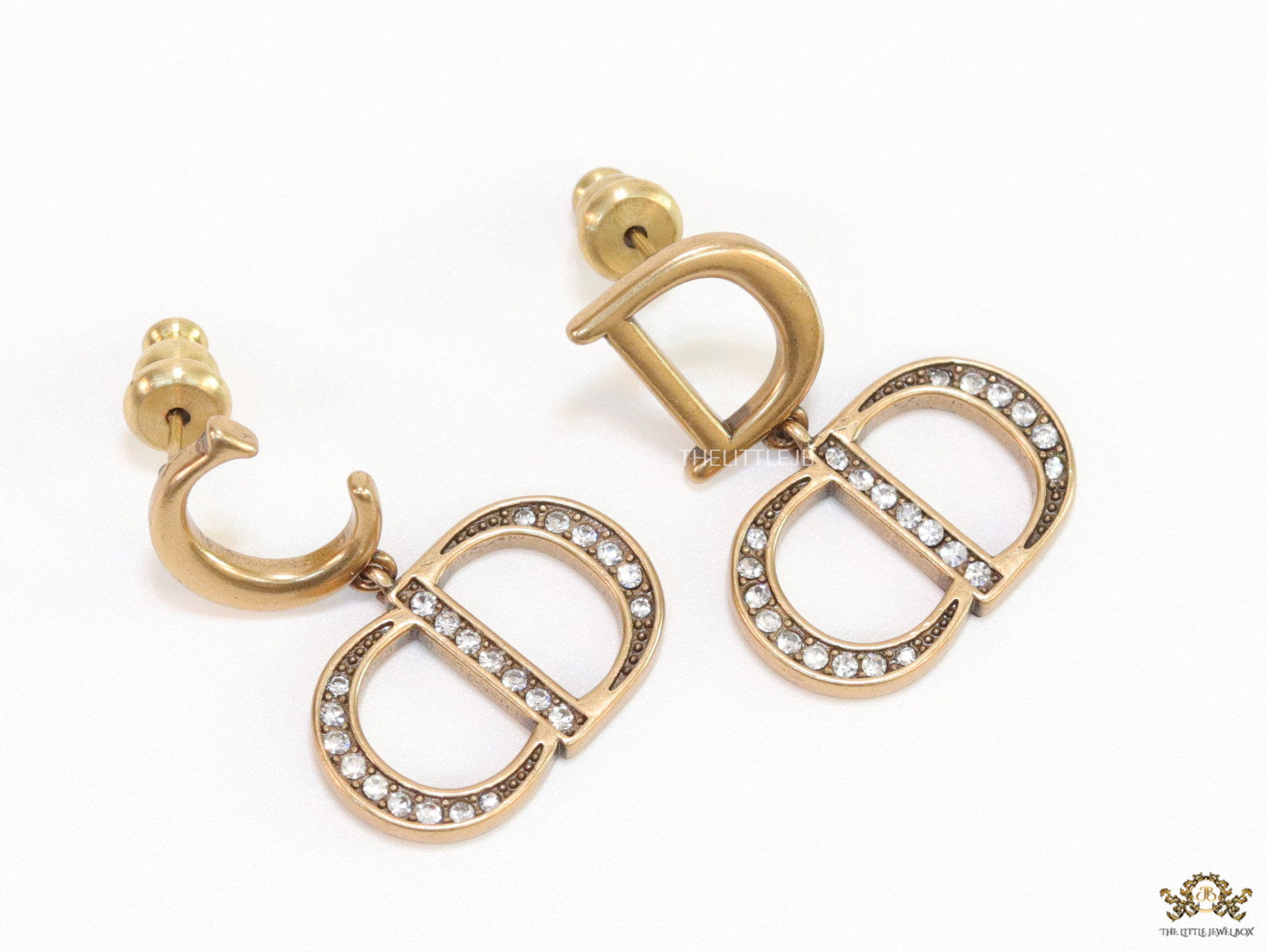 Designer alphabet earrings in gold and cz