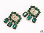 Emerald Green stone studs with gold plated double G motif and emerald green stone drop