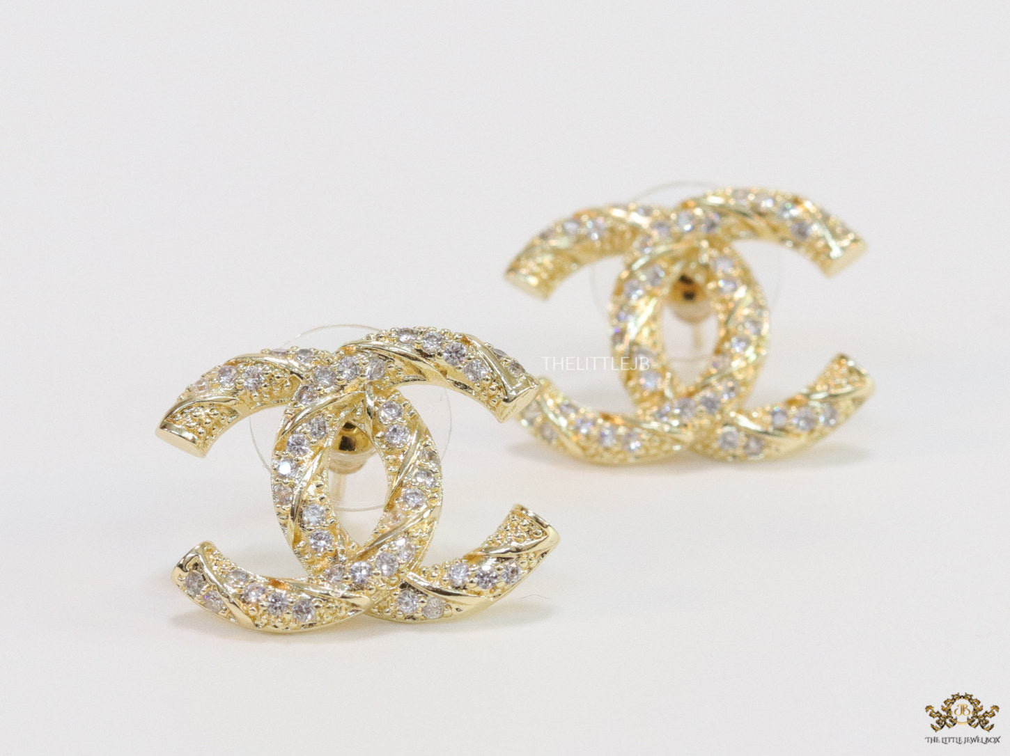 Gold plated double C studs with cz