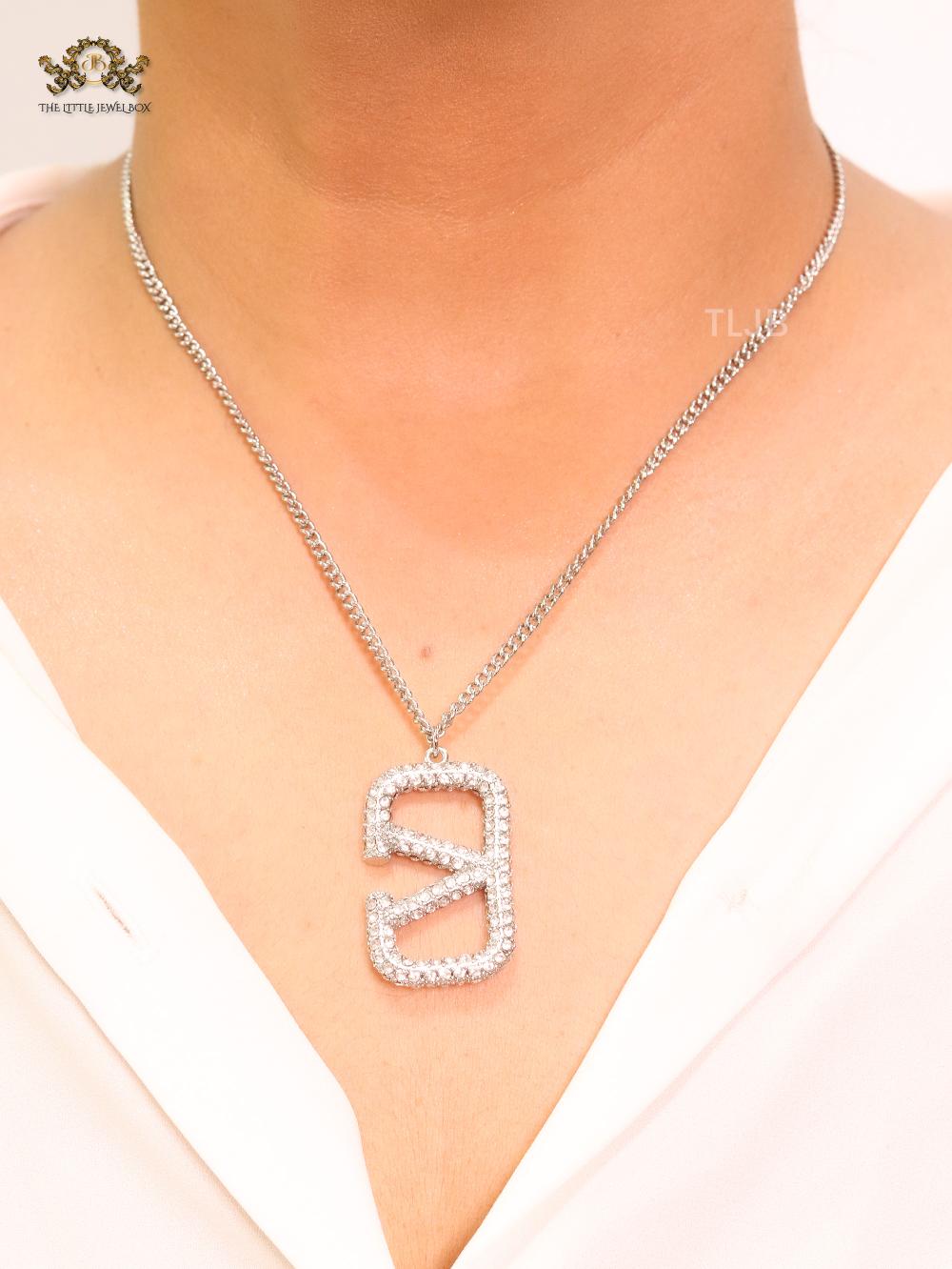 Open V Platinum plated vertical charm pendant with CZ