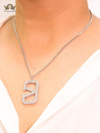 Open V Platinum plated vertical charm pendant with CZ