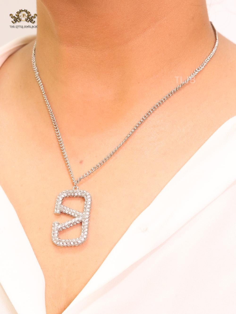 Open V Platinum plated vertical charm pendant with CZ