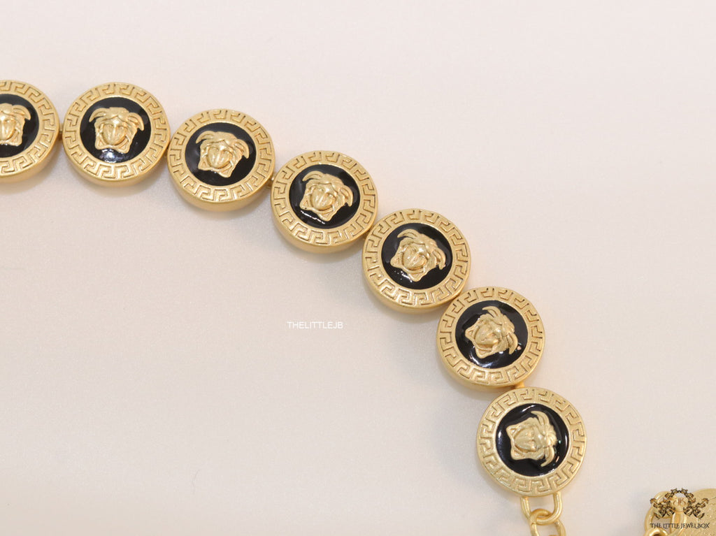 Gold plated Medusa motif on black circles necklace
