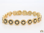 Gold plated Medusa motif on black circles necklace