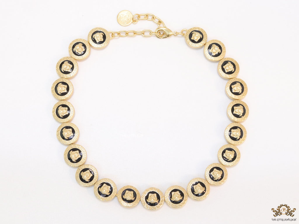 Gold plated Medusa motif on black circles necklace