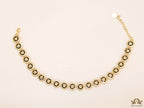 Gold plated Medusa motif on black circles necklace