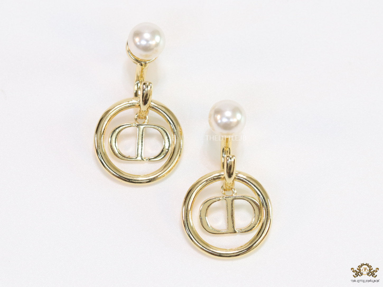 Golden alphabet earrings with pearl tops