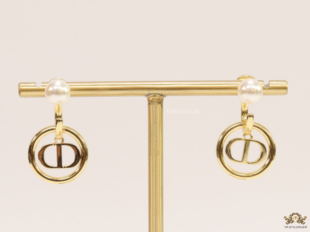 Golden alphabet earrings with pearl tops