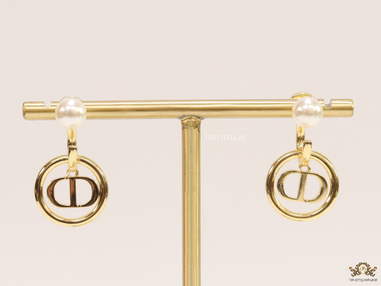 Golden alphabet earrings with pearl tops
