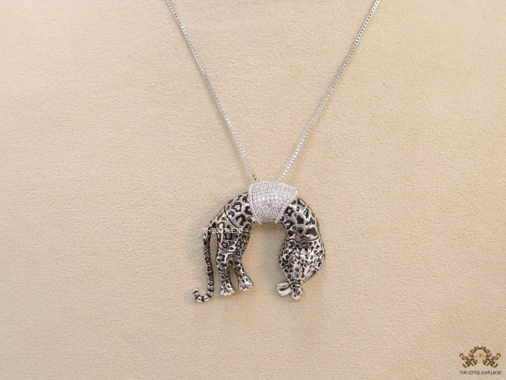 Platinum plated resting leopard pendant with cubic zirconia and Platinum chain