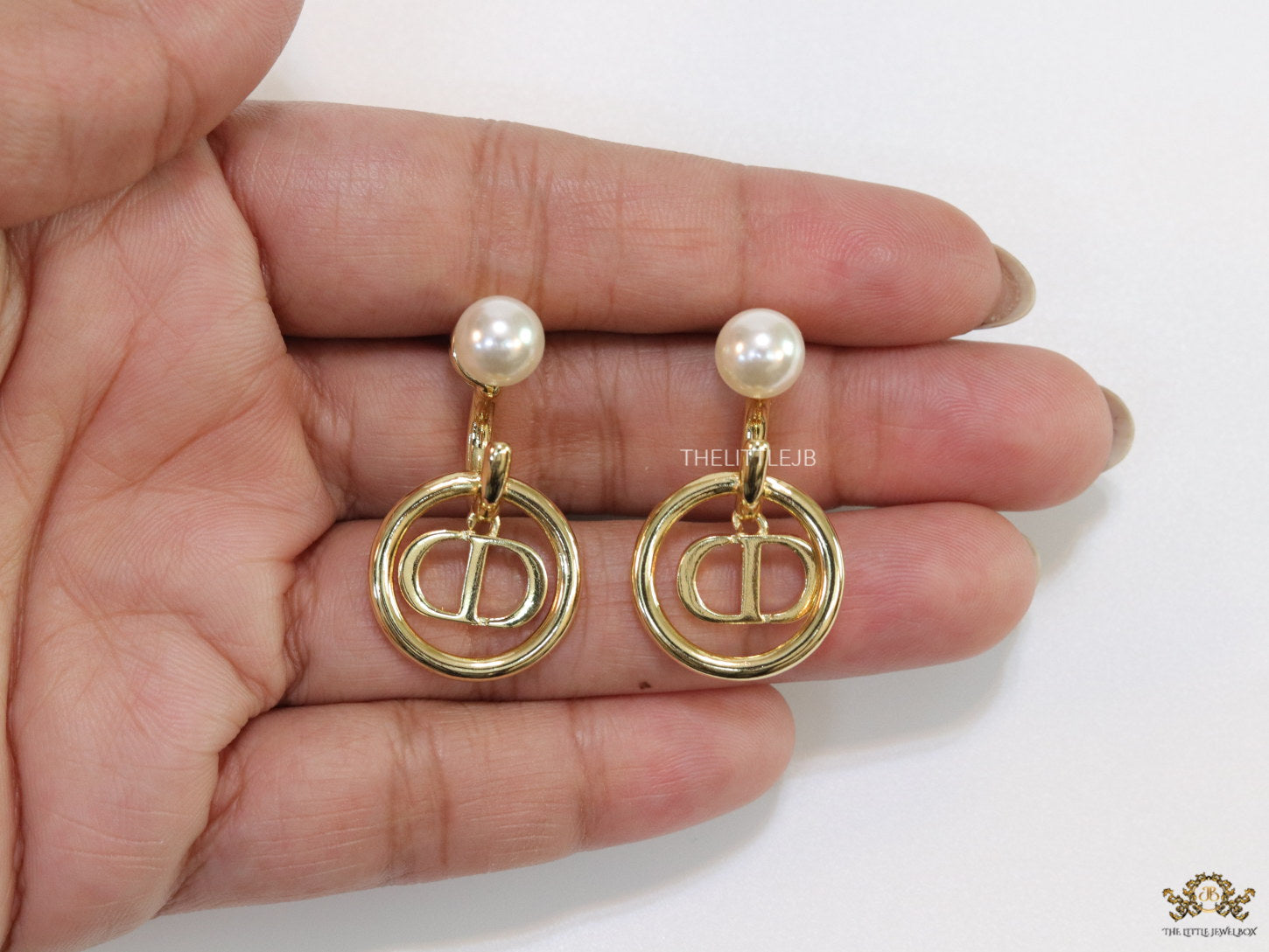 Golden alphabet earrings with pearl tops