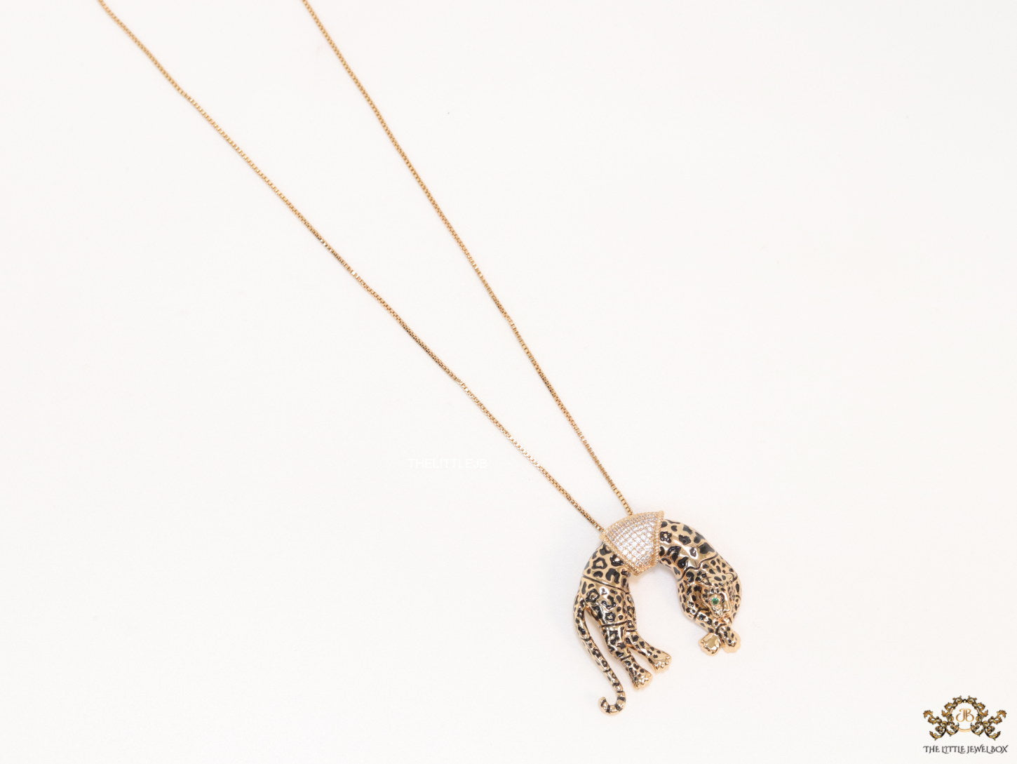 Antique rose  gold resting plated leopard pendant with cubic zirconia and rose golden chain