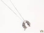 Platinum plated resting leopard pendant with cubic zirconia and Platinum chain