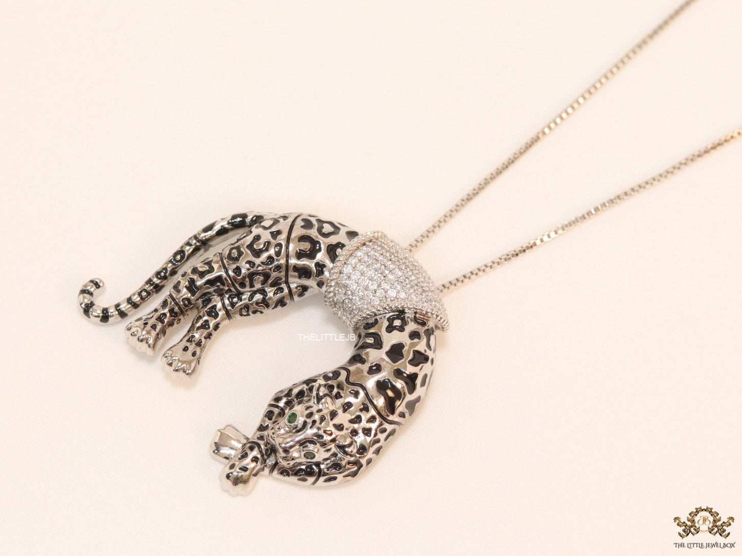 Platinum plated resting leopard pendant with cubic zirconia and Platinum chain