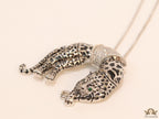 Platinum plated resting leopard pendant with cubic zirconia and Platinum chain