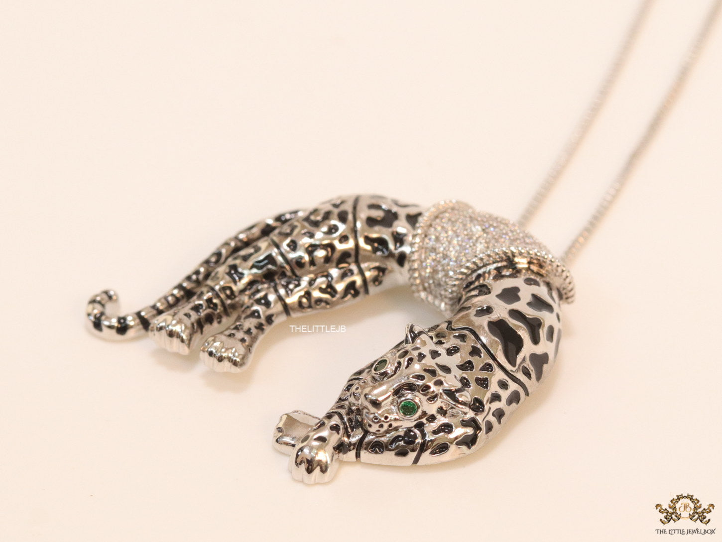 Platinum plated resting leopard pendant with cubic zirconia and Platinum chain