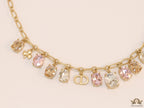 Gold plated link chain with semi precious stones charms and alphabet charm