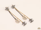 Dual chain star and moon dangles with double C motif