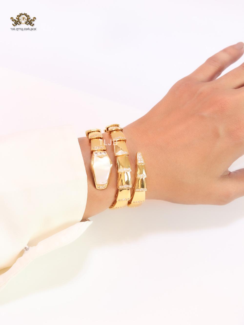 Bold gold and cz serpenti bracelet with mop head
