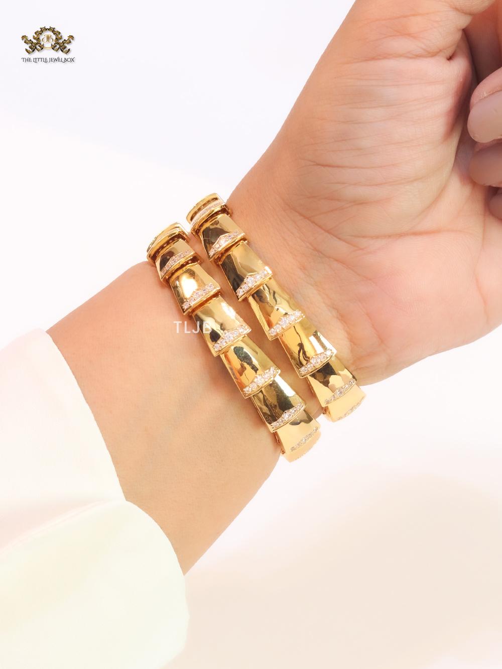 Bold gold and cz snake bracelet with mop head