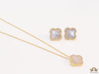 Sleek gold plated chain with cubic zirconia studded off-white clover shape pendant