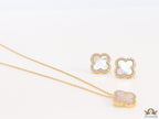Sleek gold plated chain with cubic zirconia studded off-white clover shape pendant