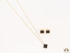 Sleek gold plated chain with cubic zirconia studded black clover shape pendant