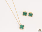 Sleek gold plated chain with cubic zirconia studded green clover shape pendant