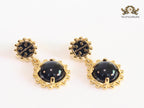 Black and gold dangles