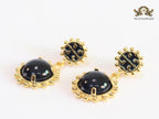 Black and gold dangles