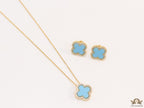 Sleek gold plated chain with cubic zirconia studded blue clover shape pendant