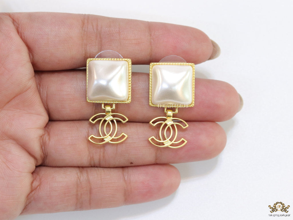 Gold plated Square MOP studs with double C motif
