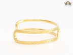 Medusa on gold bracelet
