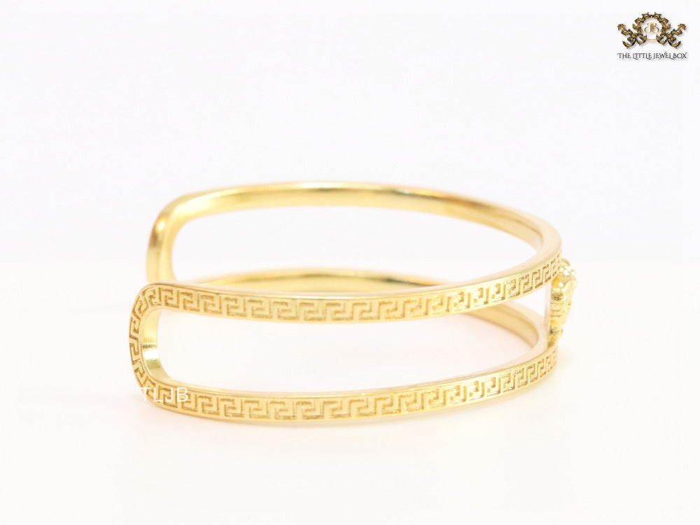 Medusa on gold bracelet