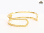 Medusa on gold bracelet