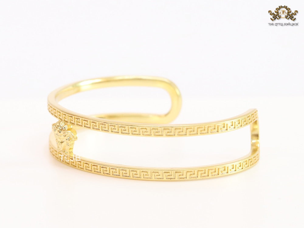 Medusa on gold bracelet