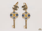 Gold plated key earrings with double C motif and clovers