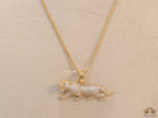 Gold plated cubic zirconia panther pendant on sleek gold plated chain