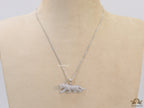 Platinum plated cubic zirconia panther pendant on sleek Platinum plated chain