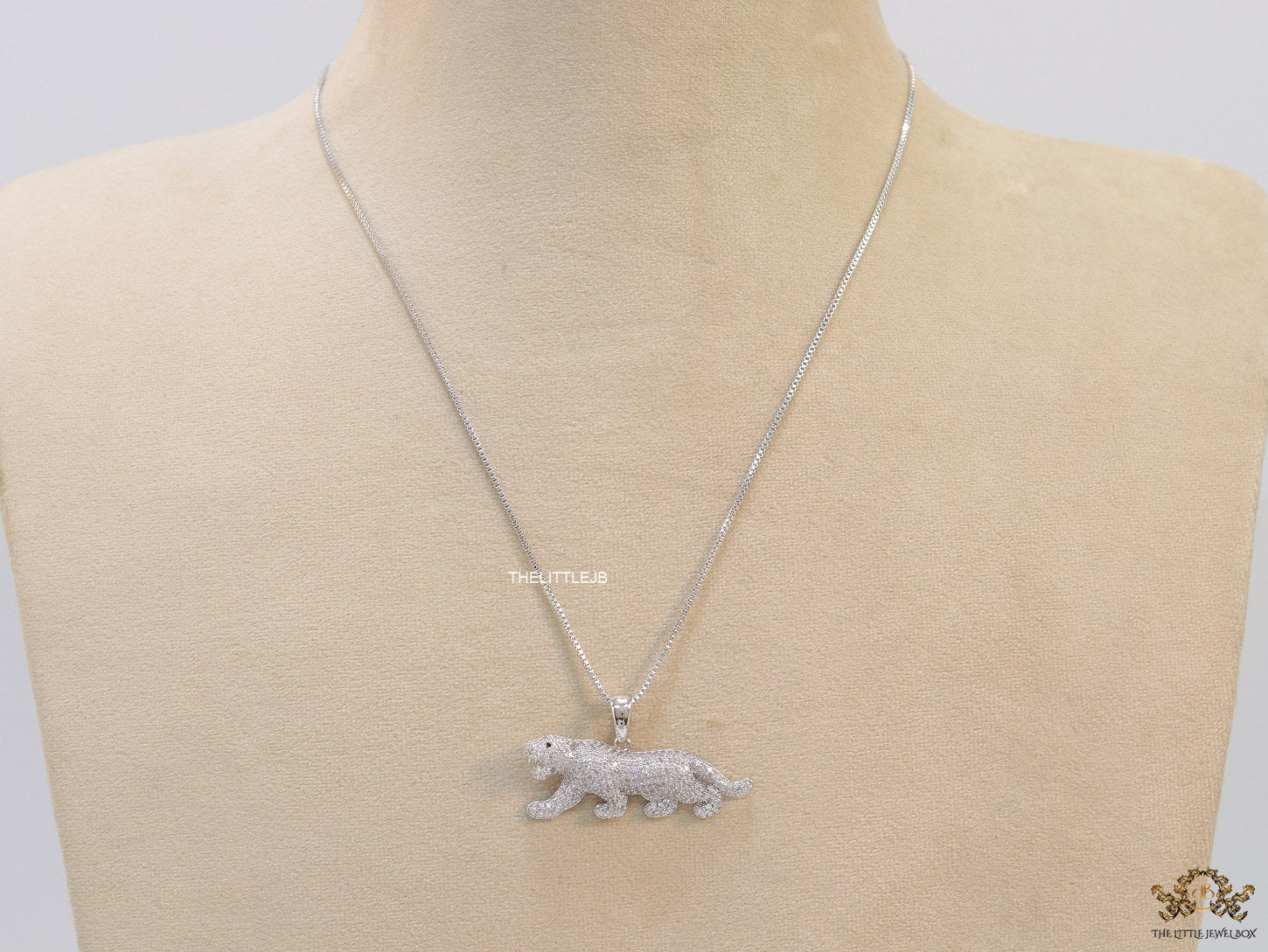 Platinum plated cubic zirconia panther pendant on sleek Platinum plated chain