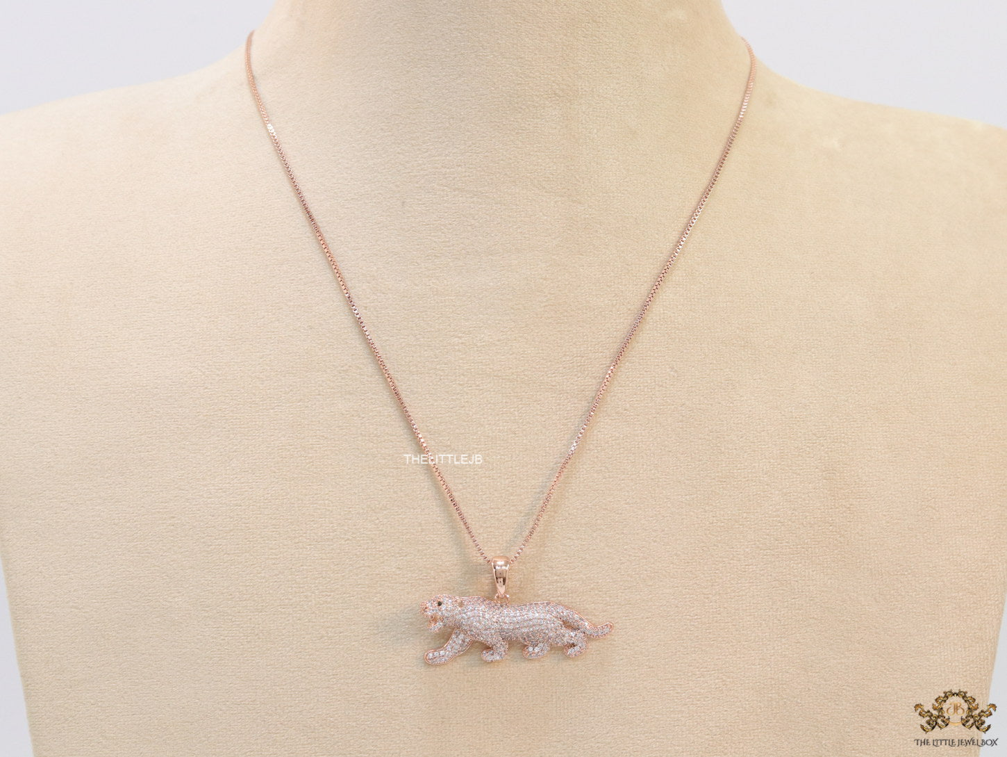 Rose Gold plated cubic zirconia panther pendant on sleek platinum plated chain