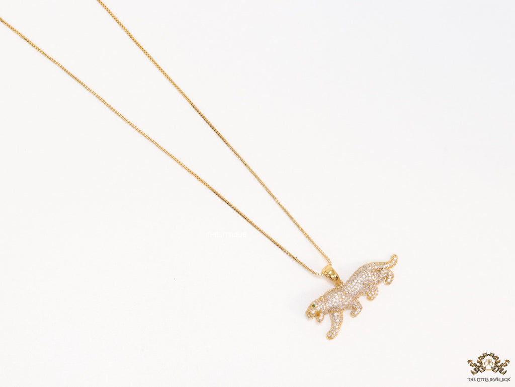 Gold plated cubic zirconia panther pendant on sleek gold plated chain