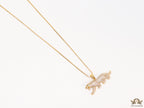 Gold plated cubic zirconia panther pendant on sleek gold plated chain