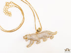 Gold plated cubic zirconia panther pendant on sleek gold plated chain