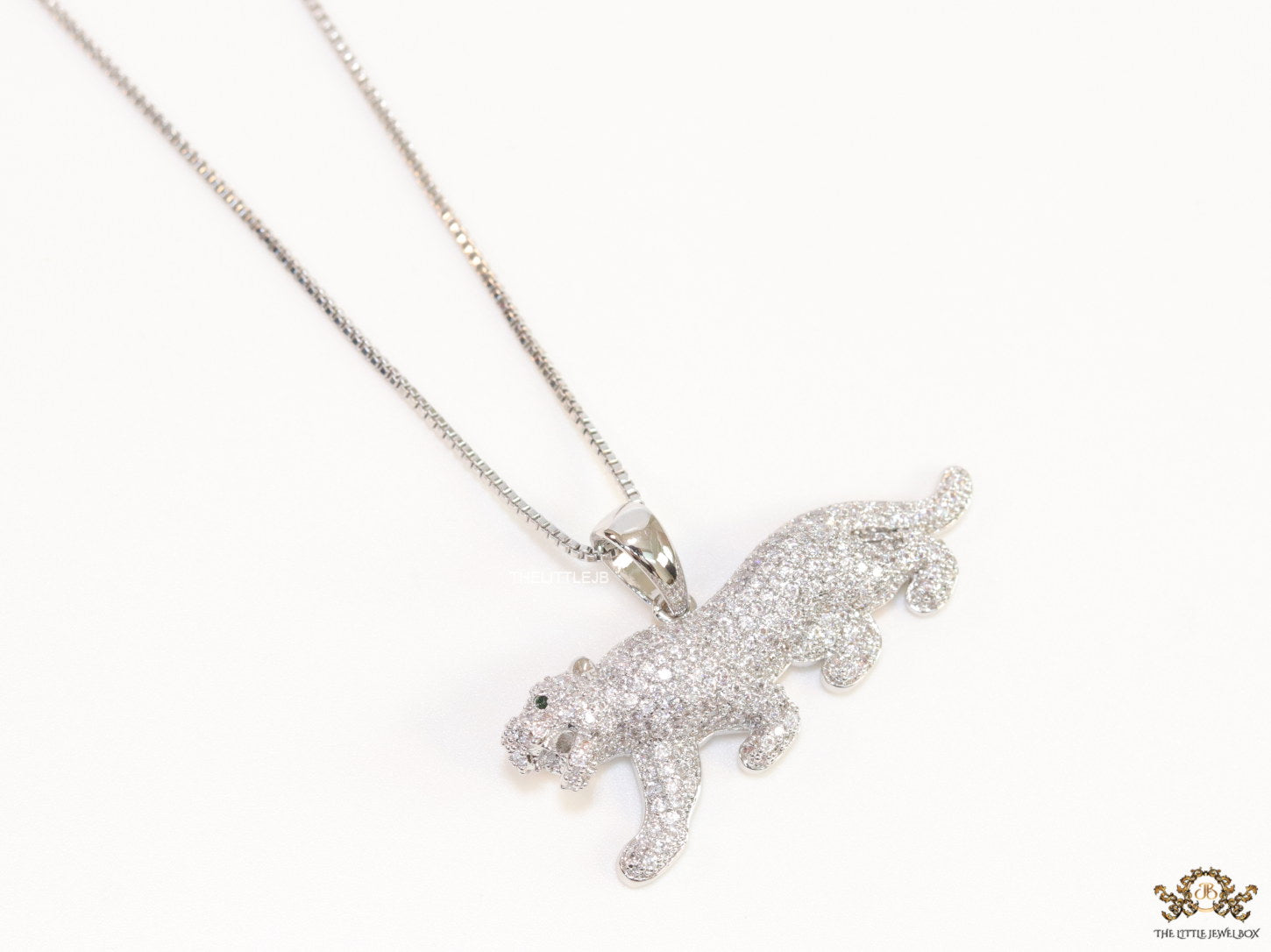 Platinum plated cubic zirconia panther pendant on sleek Platinum plated chain