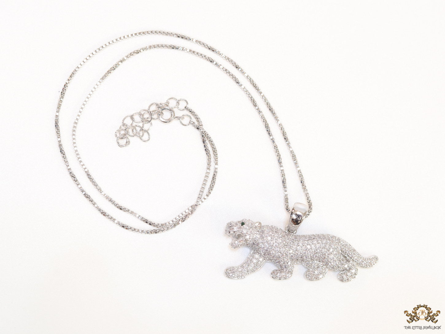 Platinum plated cubic zirconia panther pendant on sleek Platinum plated chain